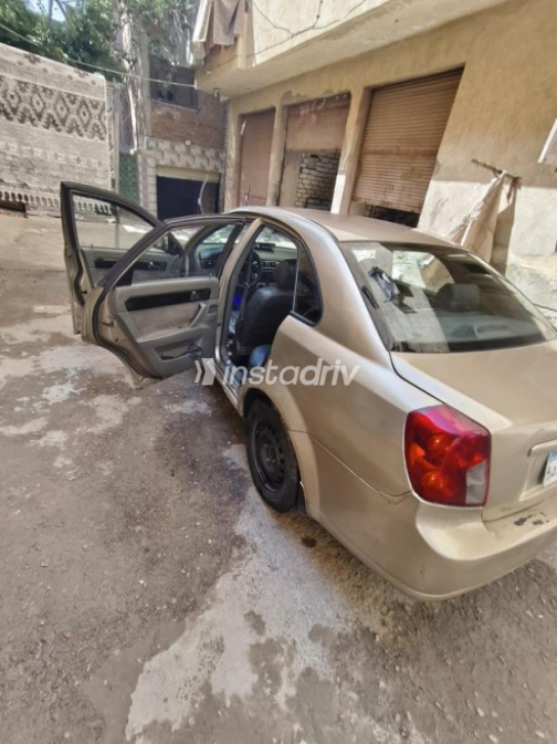 Chevrolet Optra 2010 Gold Manual Used for Sale in Alexandria - 3