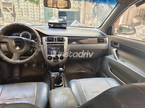 Chevrolet Optra 2010 Gold Manual Used for Sale in Alexandria - 5