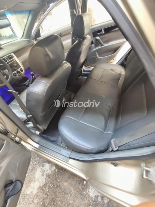 Chevrolet Optra 2010 Gold Manual Used for Sale in Alexandria - 6