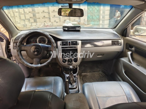 Chevrolet Optra 2010 Gold Manual Used for Sale in Alexandria - 7