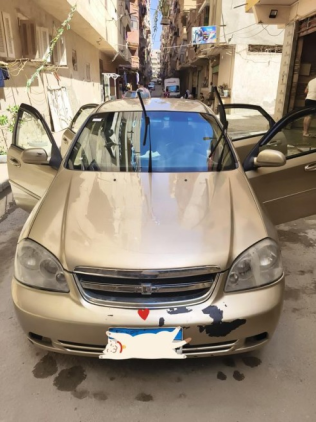Chevrolet Optra 2010 Gold Manual Used for Sale in Alexandria