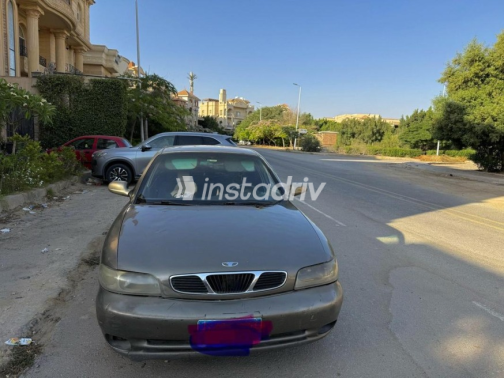 دايو نوبيرا 1 1999 ذهبي يدوي مستعملة للبيع في الجيزة - 1