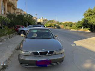دايو نوبيرا 1 1999 ذهبي يدوي مستعملة للبيع في الجيزة