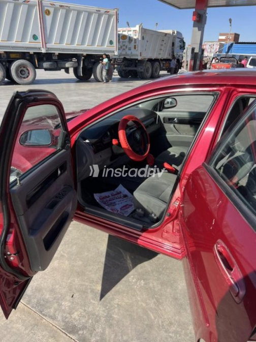 Chevrolet Optra 2011 Dark Red Automatic Used for Sale in El Minya - 6