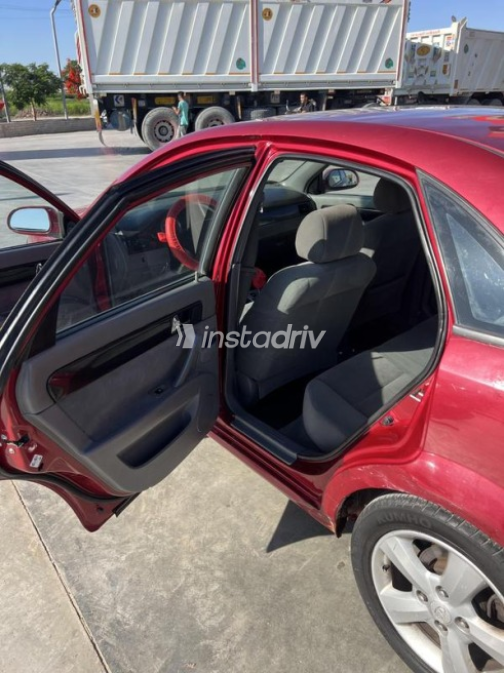 Chevrolet Optra 2011 Dark Red Automatic Used for Sale in El Minya - 7