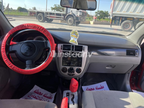Chevrolet Optra 2011 Dark Red Automatic Used for Sale in El Minya - 10