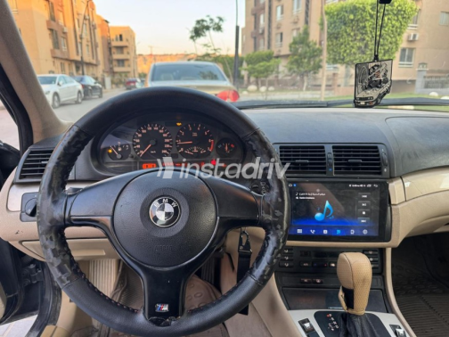بي ام دبليو 318 2001 أسود أوتوماتيك مستعملة للبيع في مدينة الشيخ زايد - 5