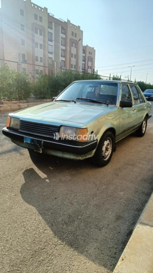 Mazda 323 1981 Olive Green Manual Used for Sale in Shobra - 1