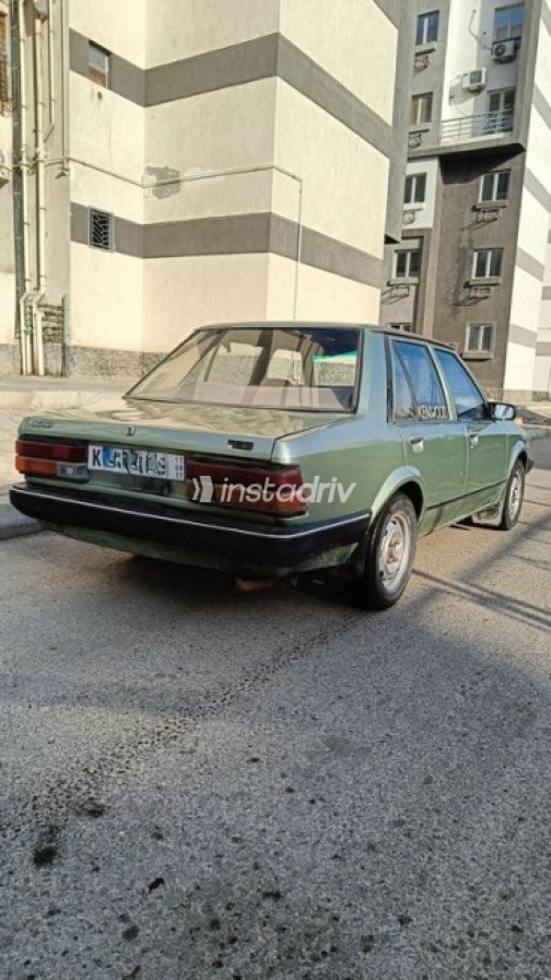 Mazda 323 1981 Olive Green Manual Used for Sale in Shobra - 3
