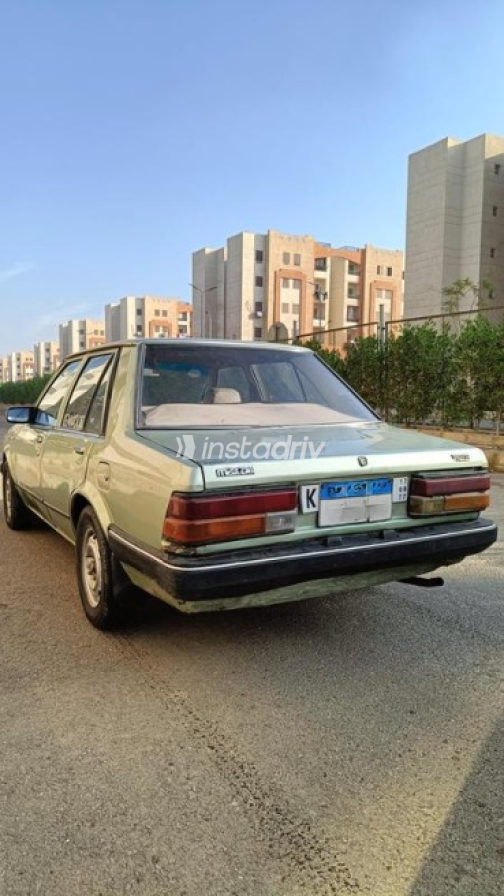 Mazda 323 1981 Olive Green Manual Used for Sale in Shobra - 4
