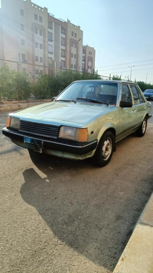 Mazda 323 1981 Olive Green Manual Used for Sale in Shobra