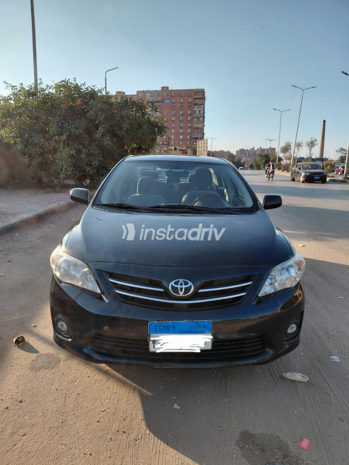 Toyota Corolla 2012 Black Automatic Used for Sale in Imbaba - 6
