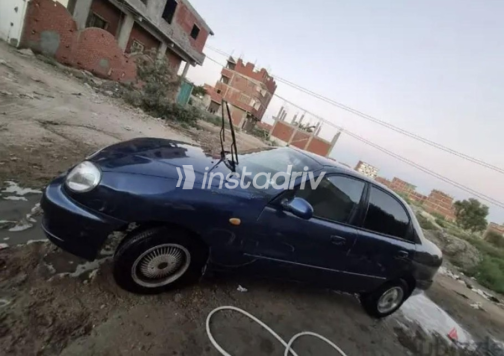 شيفروليه لانوس 2019 أزرق غامق يدوي مستعملة للبيع في الإسكندرية - 1