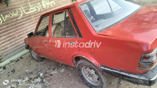 Mazda 323 1982 Red Manual Used for Sale in Greater Cairo ( Cairo + Giza) - 3