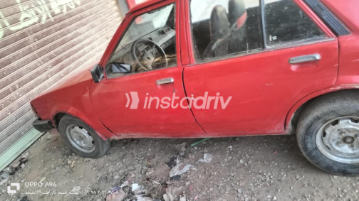 Mazda 323 1982 Red Manual Used for Sale in Greater Cairo ( Cairo + Giza) - 4