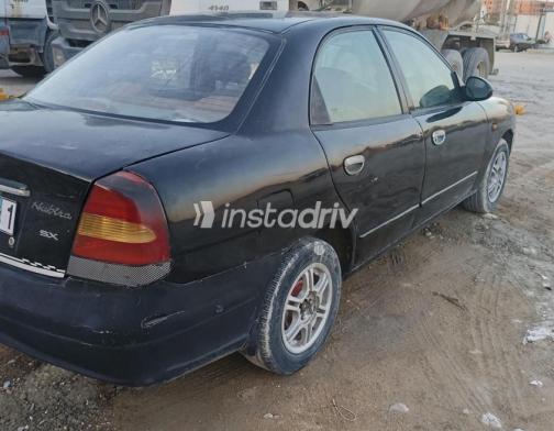 دايو نوبيرا 2 2002 أسود يدوي مستعملة للبيع في مدينة بدر - 7