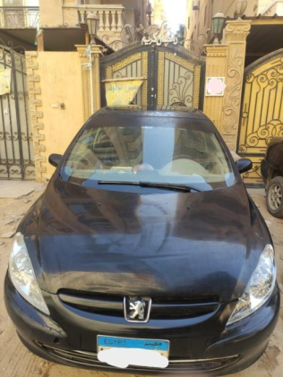 بيجو 307 2005 أسود أوتوماتيك مستعملة للبيع في حدائق الاهرام