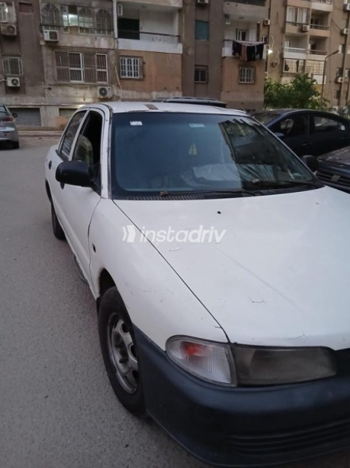 Mitsubishi Lancer 1992 White Manual Used for Sale in Nasr city - 2