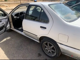 نيسان صنى 2000 أبيض يدوي مستعملة للبيع في القاهرة