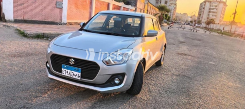 Suzuki Swift 2021 White Automatic Used for Sale in Greater Cairo ( Cairo + Giza) - 1