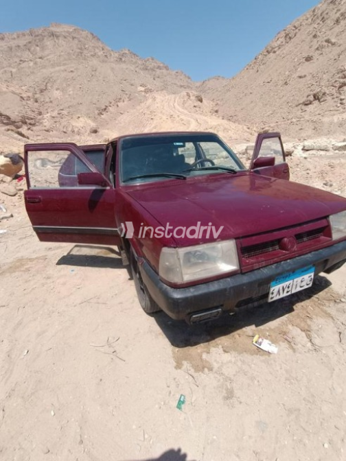 فيات شاهين 1995 أحمر غامق يدوي مستعملة للبيع في القاهرة - 1