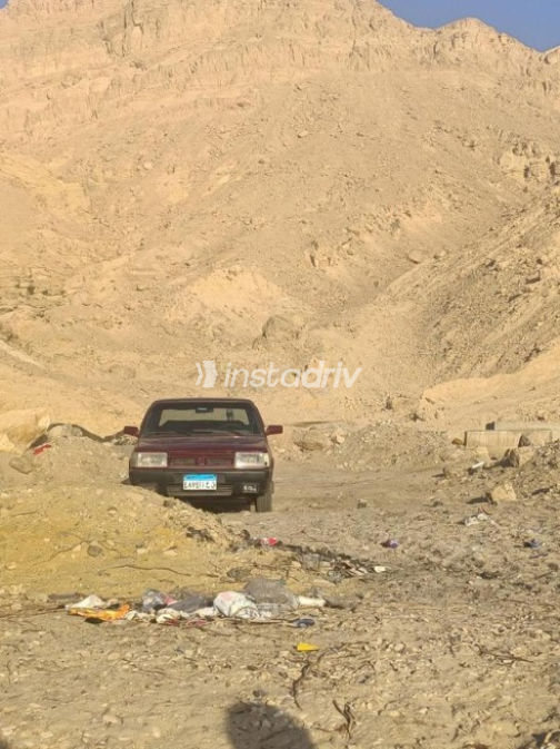 فيات شاهين 1995 أحمر غامق يدوي مستعملة للبيع في القاهرة - 4