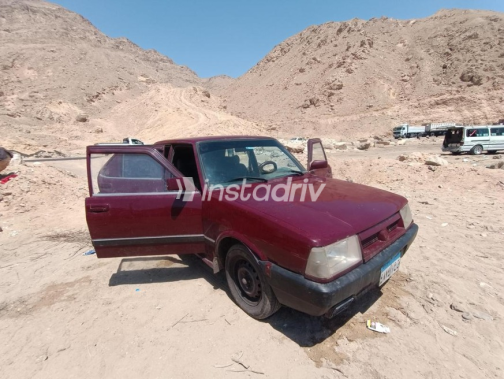 فيات شاهين 1995 أحمر غامق يدوي مستعملة للبيع في القاهرة - 8