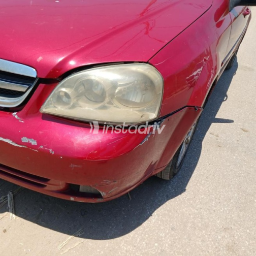 Chevrolet Optra 2010 Dark Red Automatic Used for Sale in Shibin El Qanater - 7