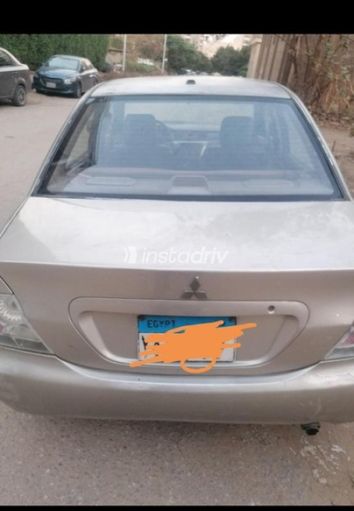 Mitsubishi Lancer 2004 Champagne Manual Used for Sale in Giza - 2