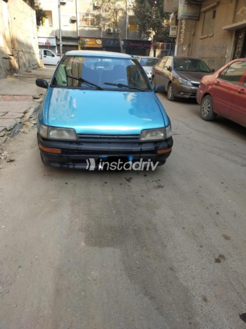 Daihatsu Charade 1991 Turquoise Automatic Used for Sale in Helwan - 1
