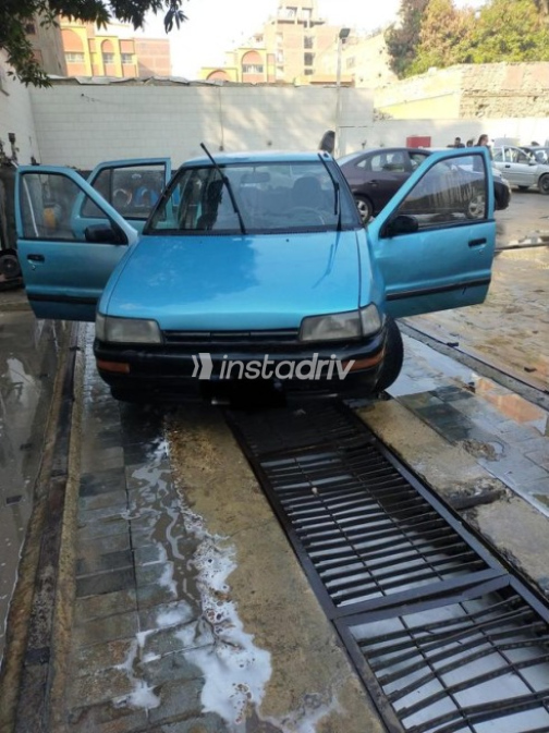 Daihatsu Charade 1991 Turquoise Automatic Used for Sale in Helwan - 4