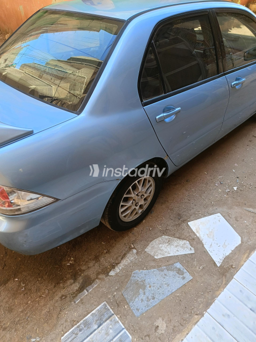 Mitsubishi Lancer 2005 White Automatic Used for Sale in Gharbia - 2