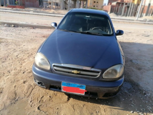 شيفروليه لانوس 2015 أزرق غامق يدوي مستعملة للبيع في العاشر من رمضان