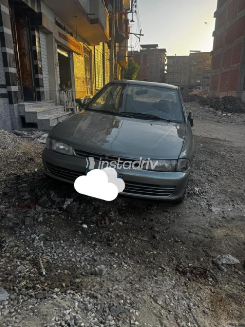Mitsubishi Lancer 1994 White Manual Used for Sale in El Mahalla - 2