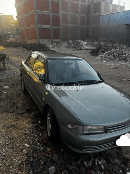 Mitsubishi Lancer 1994 White Manual Used for Sale in El Mahalla - 4