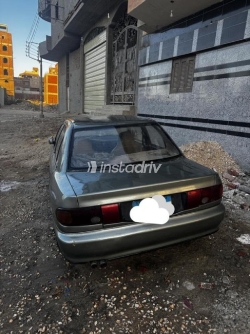 Mitsubishi Lancer 1994 White Manual Used for Sale in El Mahalla - 6