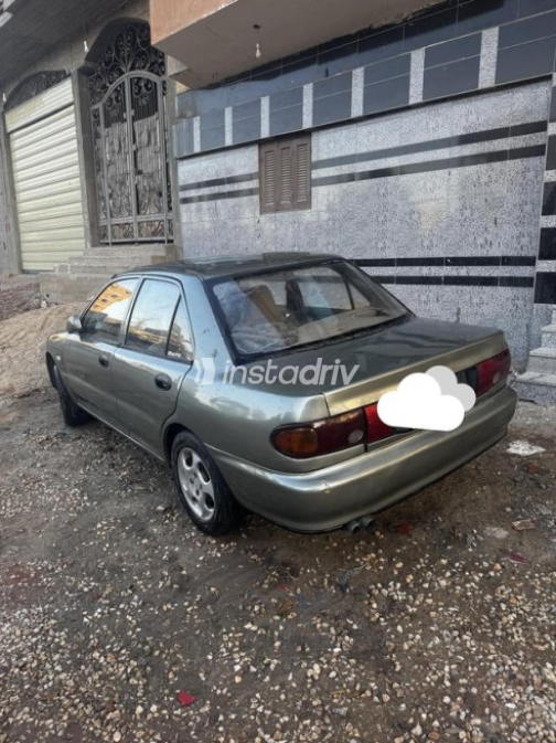 Mitsubishi Lancer 1994 White Manual Used for Sale in El Mahalla - 7