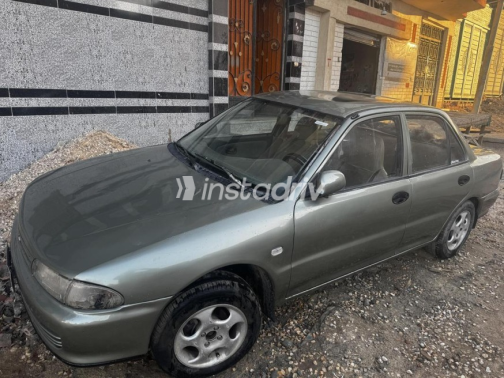 Mitsubishi Lancer 1994 White Manual Used for Sale in El Mahalla - 8