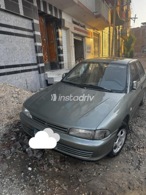 Mitsubishi Lancer 1994 White Manual Used for Sale in El Mahalla - 9