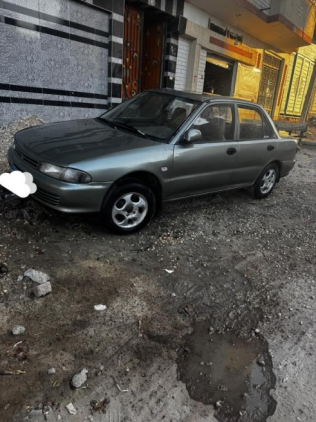 Mitsubishi Lancer 1994 White Manual Used for Sale in El Mahalla