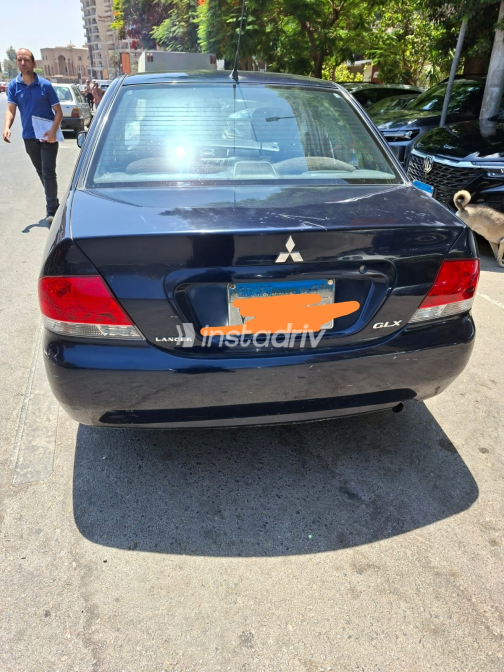 Mitsubishi Lancer Puma 2013 White Automatic Used for Sale in Heliopolis - 2