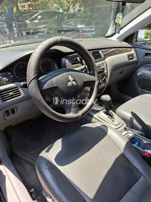 Mitsubishi Lancer Puma 2013 White Automatic Used for Sale in Heliopolis - 3