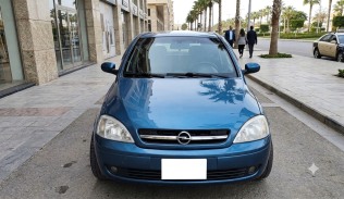 اوبل كورسا 2004 أزرق يدوي مستعملة للبيع في الهرم