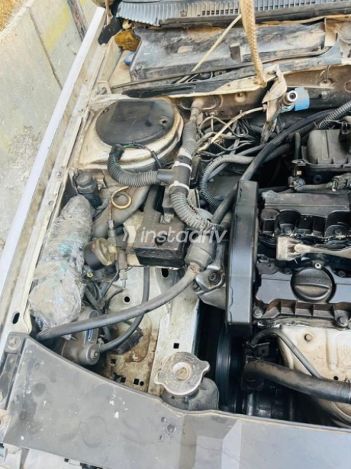 بيجو 405 2010 أبيض يدوي مستعملة للبيع في مدينه السلام - 4