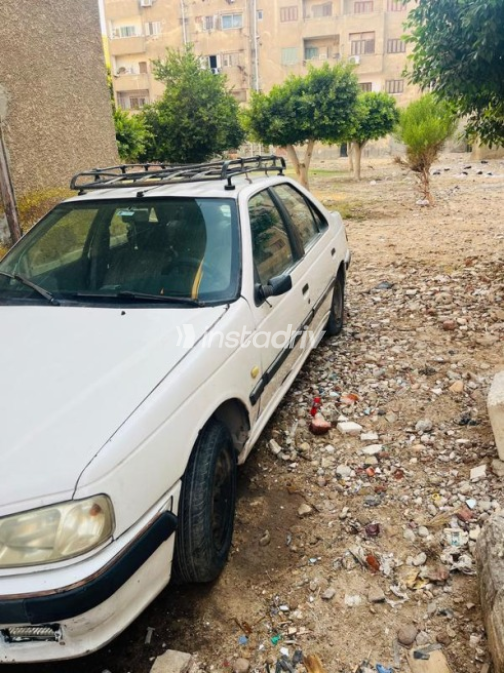 بيجو 405 2010 أبيض يدوي مستعملة للبيع في مدينه السلام - 6