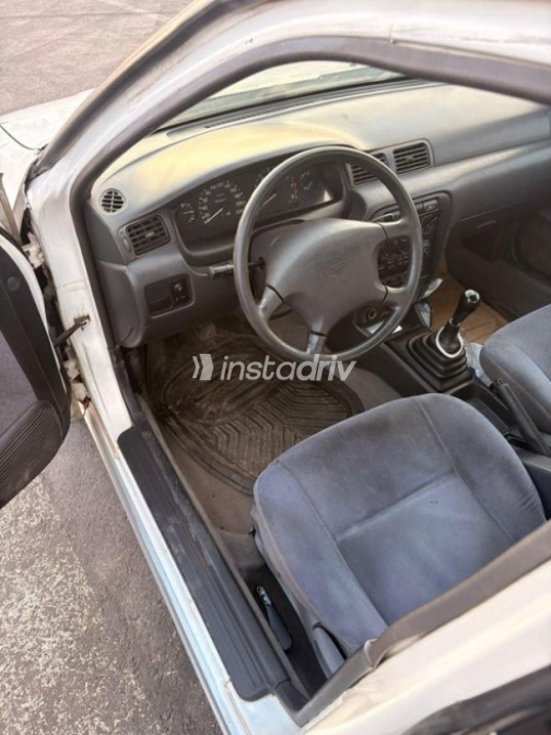 Nissan Sunny 2000 White Manual Used for Sale in Nasr city - 6