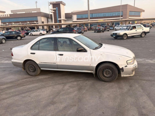 Nissan Sunny 2000 White Manual Used for Sale in Nasr city - 9