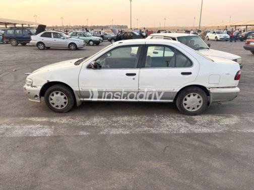 Nissan Sunny 2000 White Manual Used for Sale in Nasr city - 10