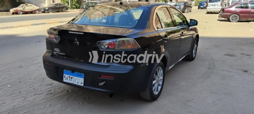 ميتسوبيشي لانسر اى اكس شارك 2015 أسود أوتوماتيك مستعملة للبيع في الجيزة - 2