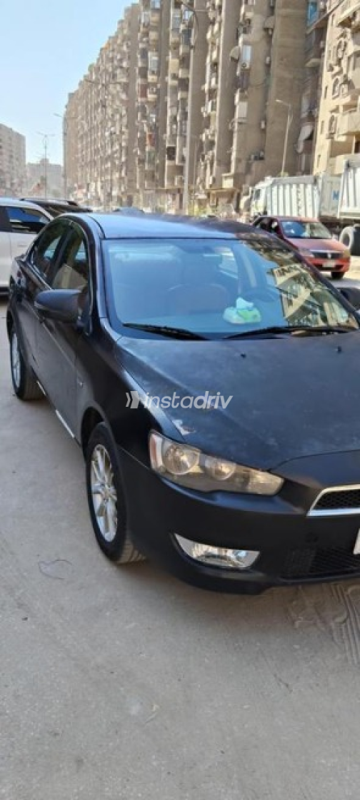 ميتسوبيشي لانسر اى اكس شارك 2015 أسود أوتوماتيك مستعملة للبيع في الجيزة - 5